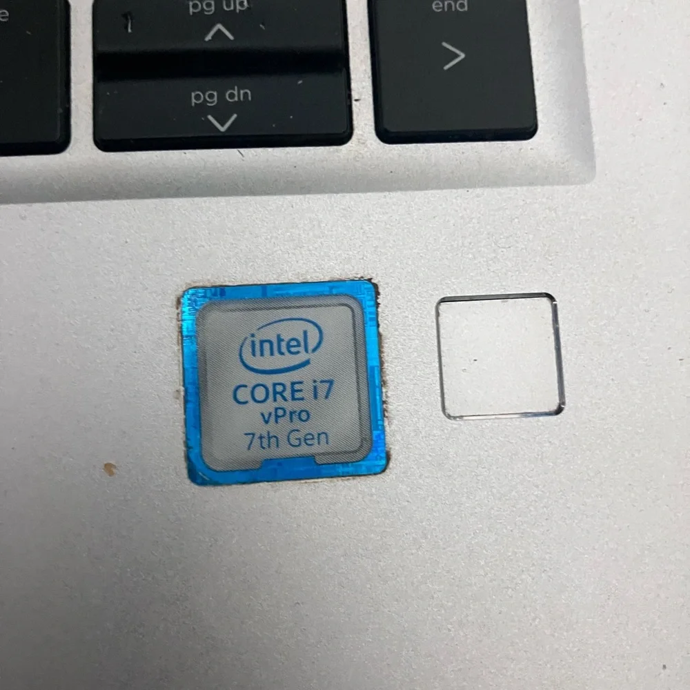 Intel Core i7 vPro Sticker on Silver Surface with Blue Accent